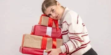 Representational image of a 19 year old girl holding gifts