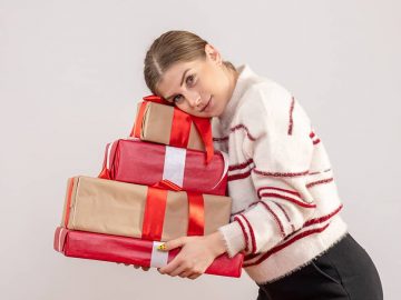 Representational image of a 19 year old girl holding gifts